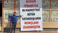 Markete asılan pankartı gören vatandaşlar gözyaşlarını tutamadı