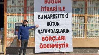 Markete asılan pankartı gören vatandaşlar gözyaşlarını tutamadı